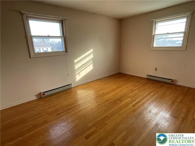 a view of an empty room and window