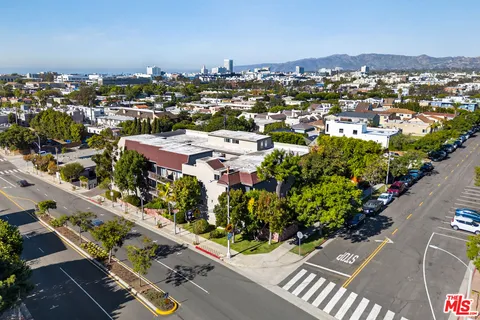an aerial view of a city with lots of residential buildings