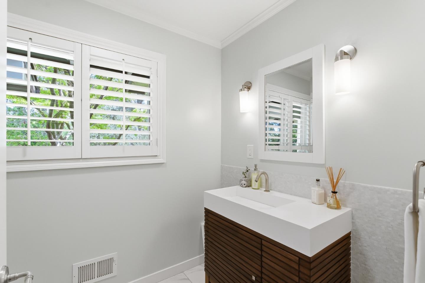 285 Ridgeway Road Woodside, CA 94062 - Photo 22 of 28 a white sink sitting next to a white sink