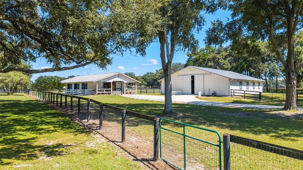 16050 Northwest 10th Circle Citra, FL 32113 - Photo 12 of 71 a view of a house with backyard and sitting area