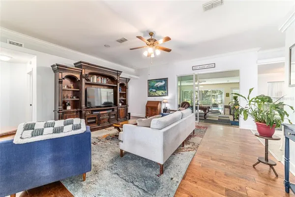 a bedroom with a bed window and walk in closet