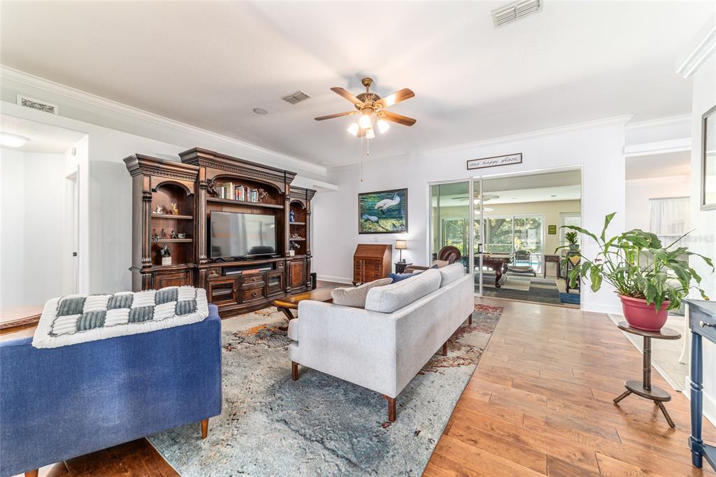 16050 Northwest 10th Circle Citra, FL 32113 - Photo 21 of 76 a living room with furniture and a flat screen tv