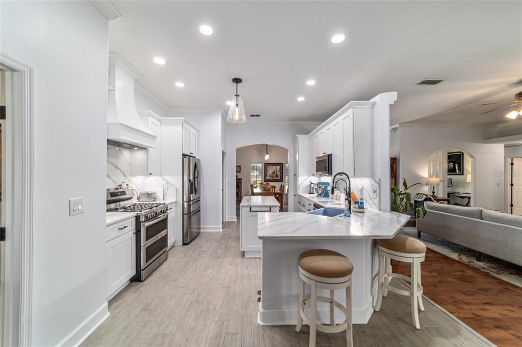 16050 Northwest 10th Circle Citra, FL 32113 - Photo 23 of 71 a large kitchen with a table and chairs