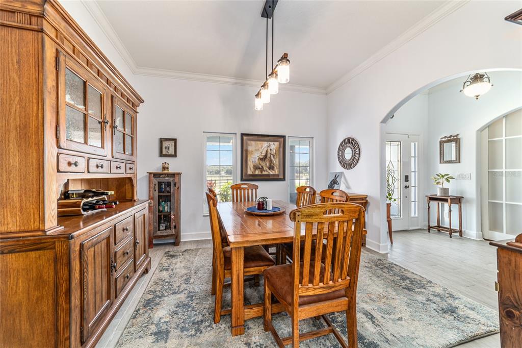 16050 Northwest 10th Circle Citra, FL 32113 - Photo 24 of 76 a view of a dining room with furniture