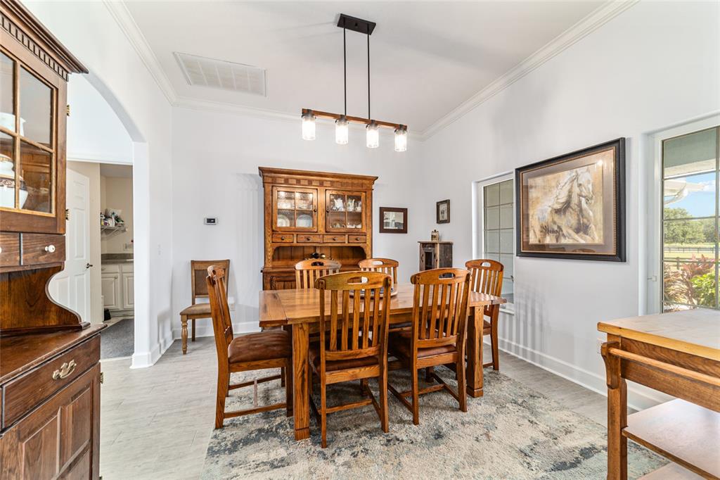 16050 Northwest 10th Circle Citra, FL 32113 - Photo 25 of 76 a view of a dining room with furniture