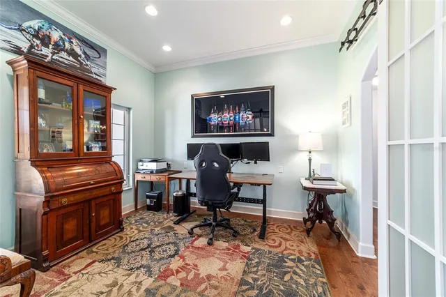 a bathroom with a sink toilet vanity and shower
