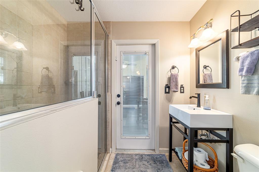 16050 Northwest 10th Circle Citra, FL 32113 - Photo 41 of 71 a bathroom with a sink a toilet and shower