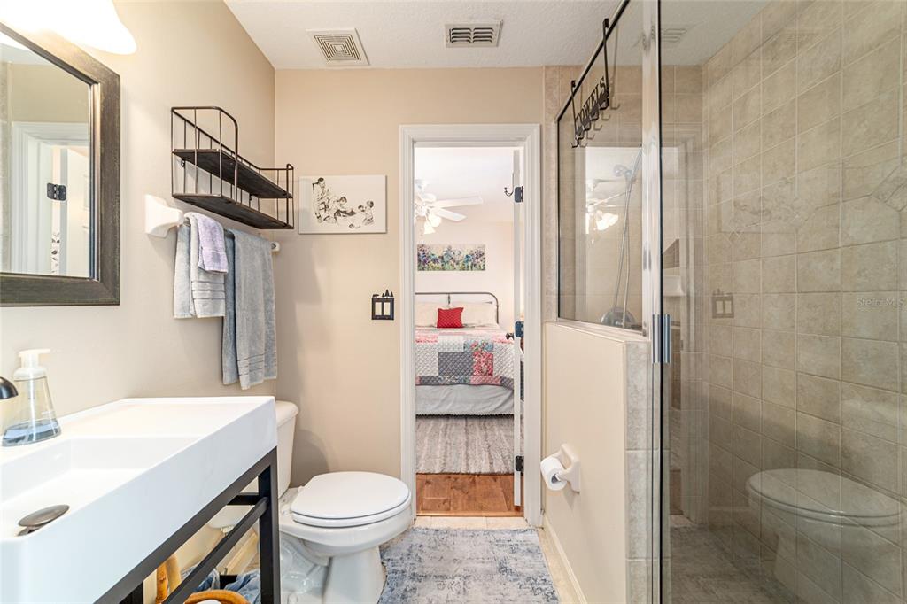 16050 Northwest 10th Circle Citra, FL 32113 - Photo 42 of 71 a bathroom with a sink toilet vanity and shower