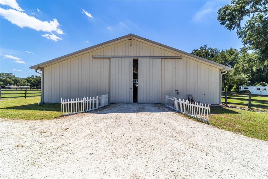 16050 Northwest 10th Circle Citra, FL 32113 - Photo 65 of 76 a front view of a house with a yard
