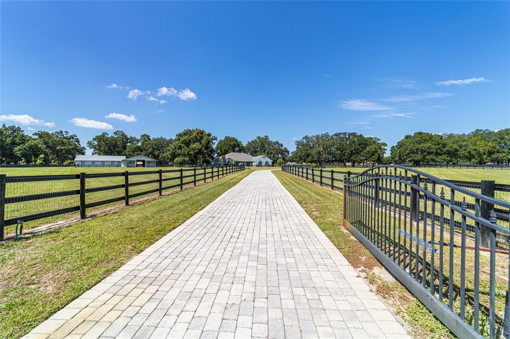 16050 Northwest 10th Circle Citra, FL 32113 - Photo 76 of 76 a view of park with wooden floor and a lake view