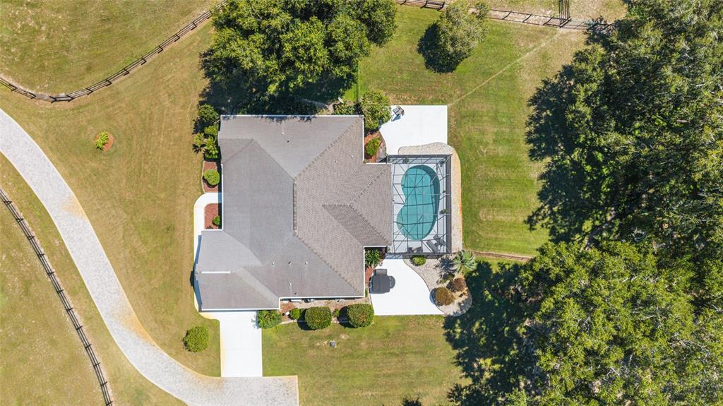 16050 Northwest 10th Circle Citra, FL 32113 - Photo 9 of 71 an aerial view of a house with swimming pool