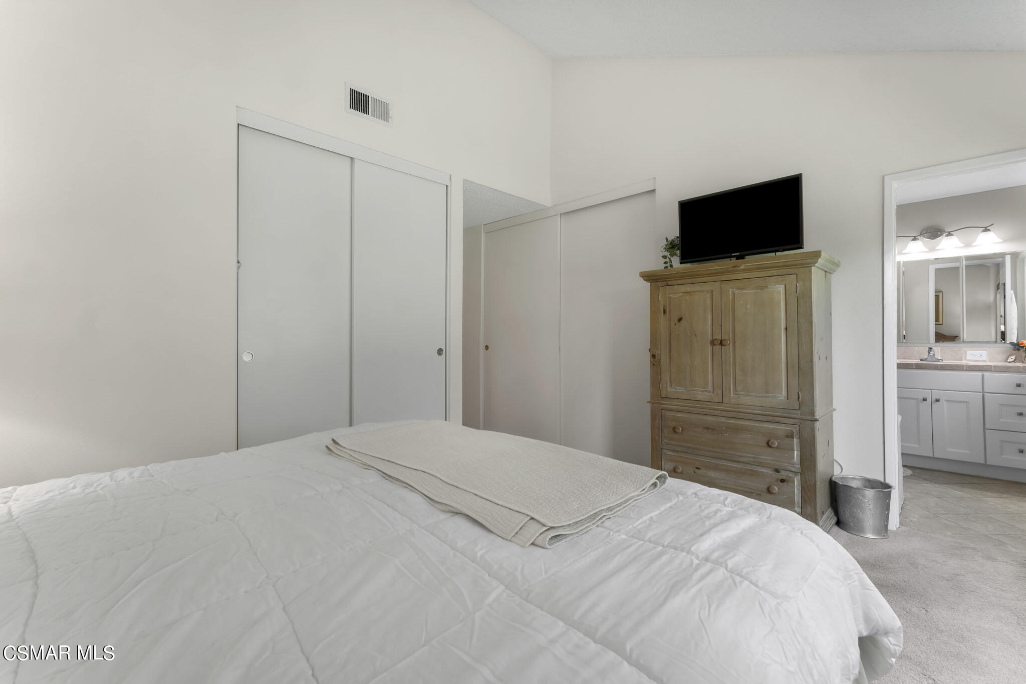 2516 Clearfield Place Simi Valley, CA 93065 - Photo 18 of 39 a bedroom with a bed and a flat screen tv