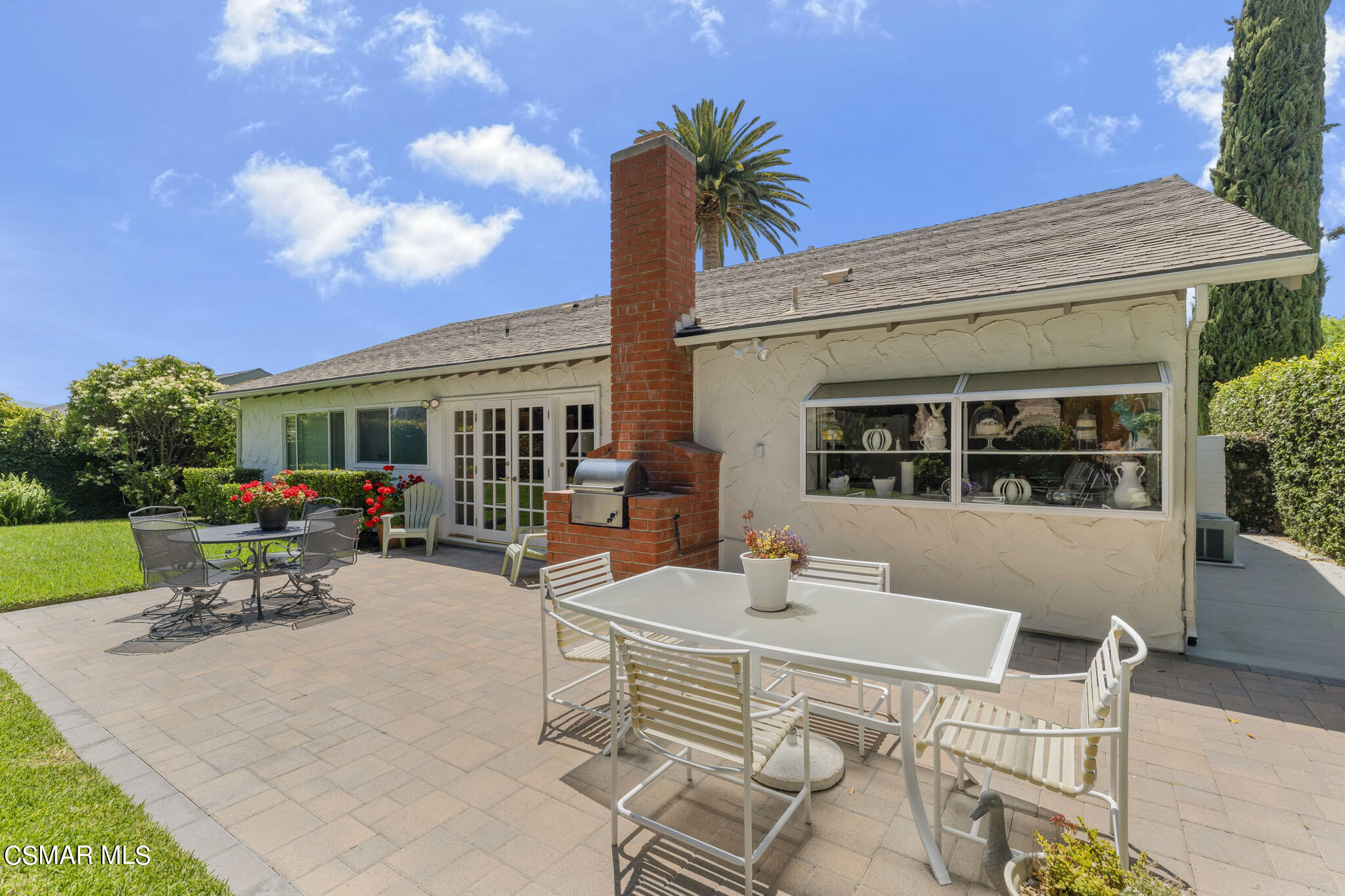 2516 Clearfield Place Simi Valley, CA 93065 - Photo 25 of 39 a view of a patio with table and chairs and potted plants