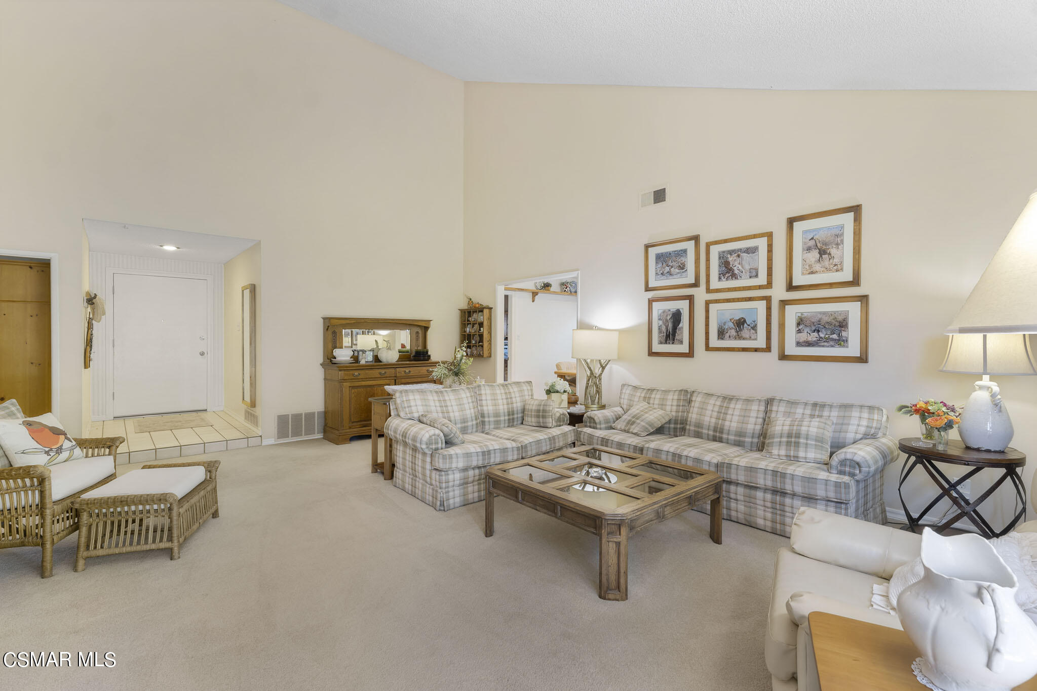 2516 Clearfield Place Simi Valley, CA 93065 - Photo 6 of 39 a living room with furniture and a table