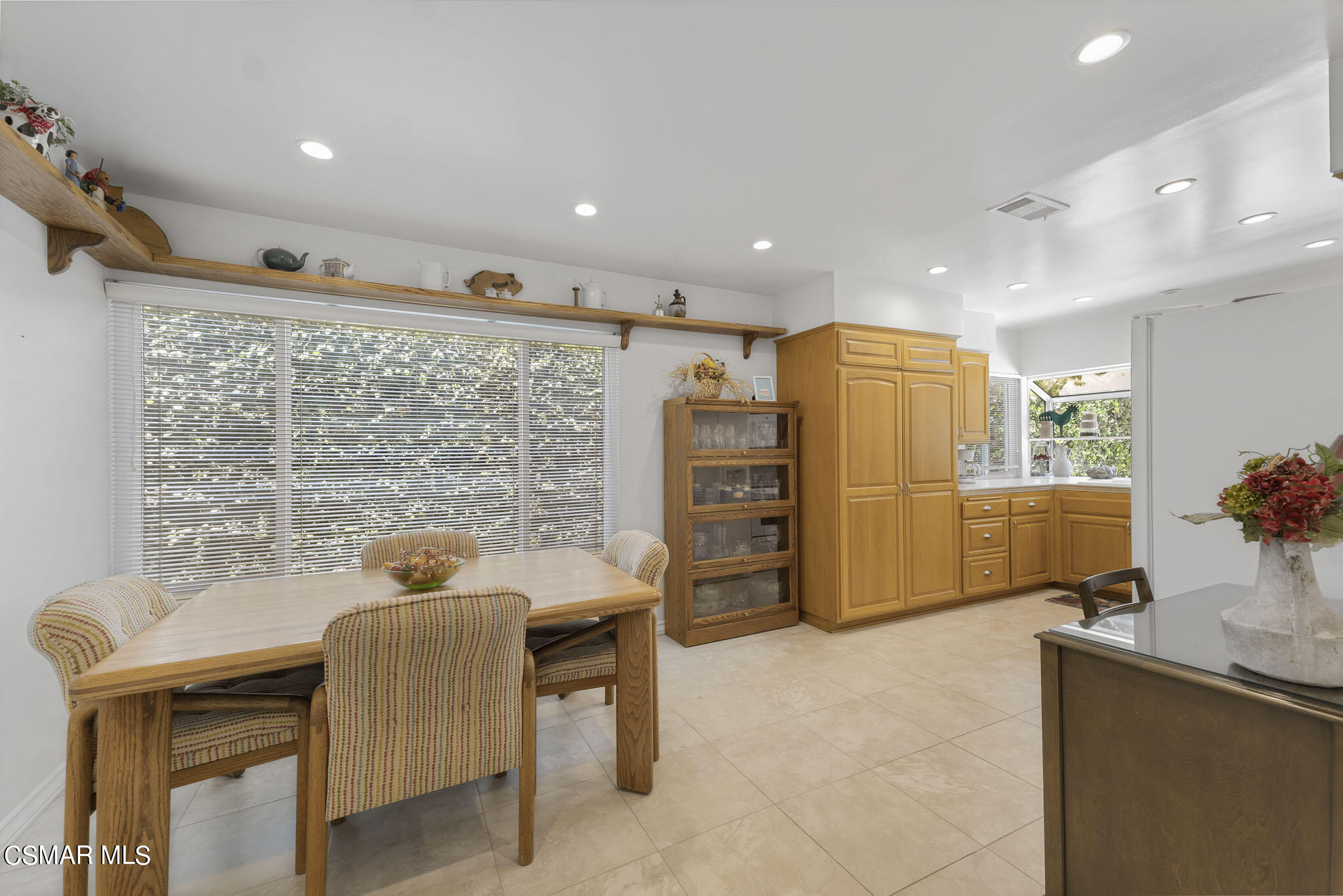 2516 Clearfield Place Simi Valley, CA 93065 - Photo 9 of 39 a view of a kitchen with a sink and cabinets