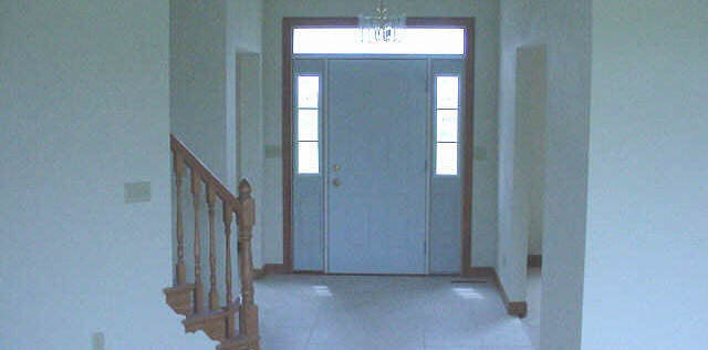 a view of a hallway with entryway