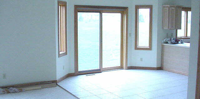 4382 Ridgeview Lane Byron, IL 61010 - Photo 3 of 5 an empty room with windows and closet