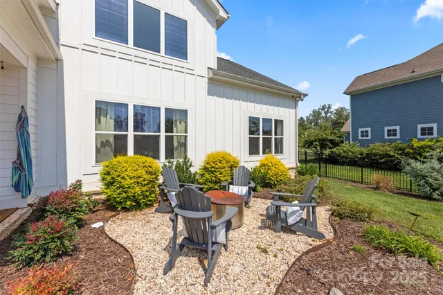 a house view with a seating space and garden space