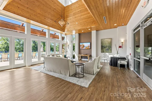 a open kitchen with stainless steel appliances granite countertop a stove and refrigerator