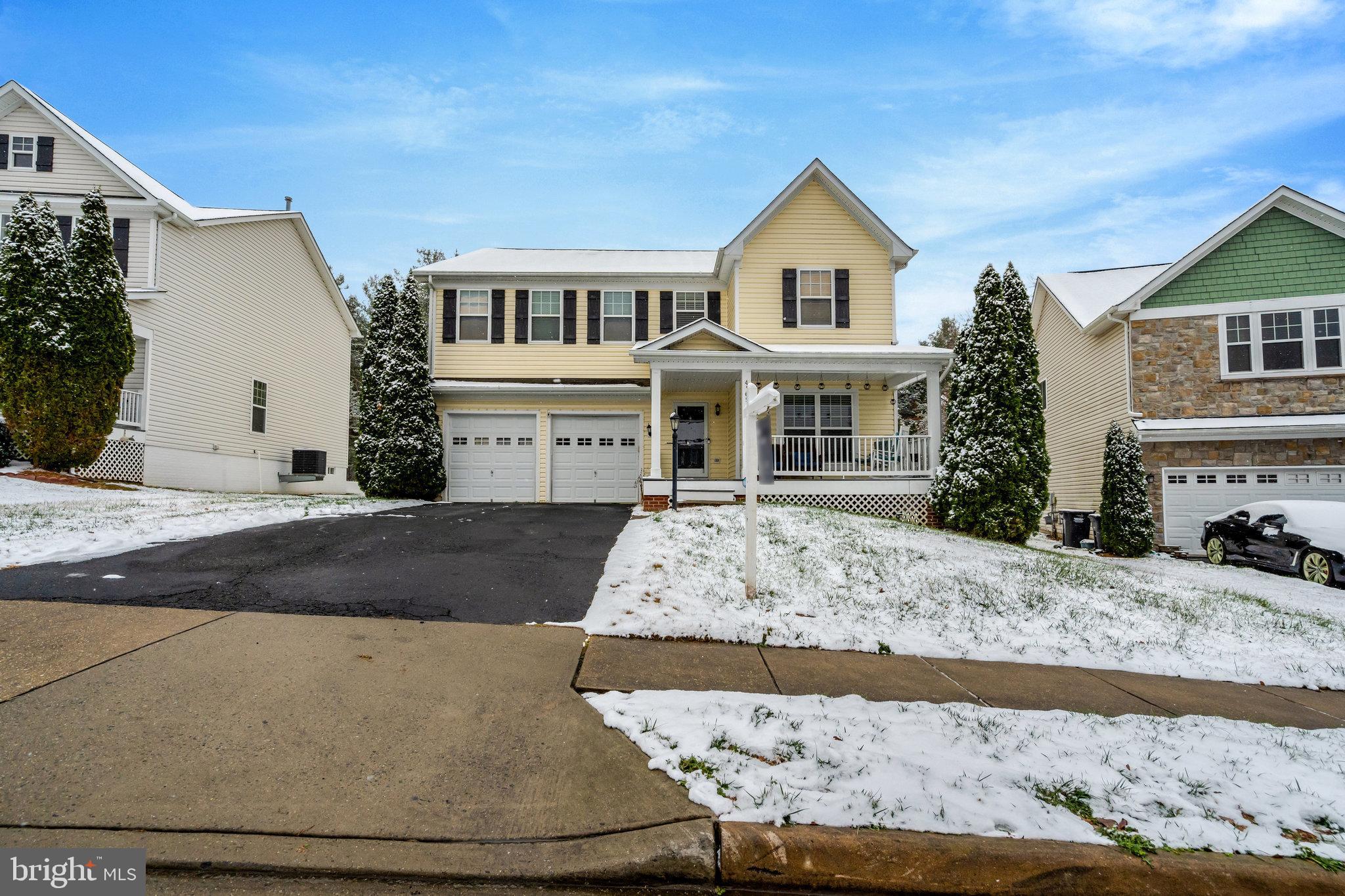 4169 Agency Loop Triangle, VA 22172 - Photo 1 of 56 Charming home nestled in a snowy landscape.