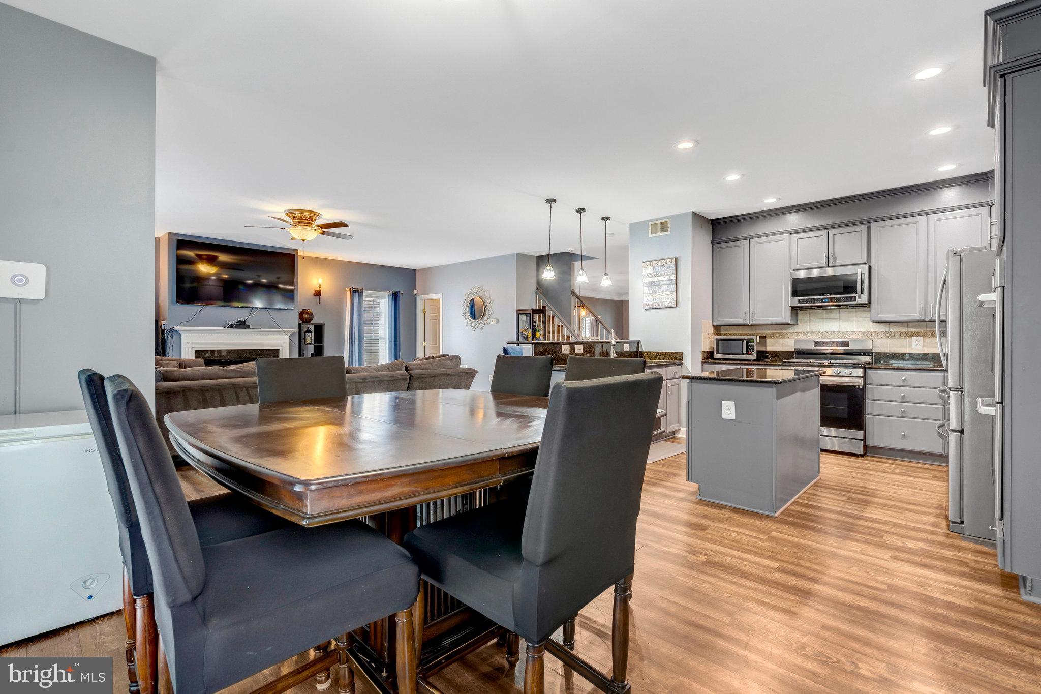 4169 Agency Loop Triangle, VA 22172 - Photo 14 of 56 Modern open-concept living space awaits you.