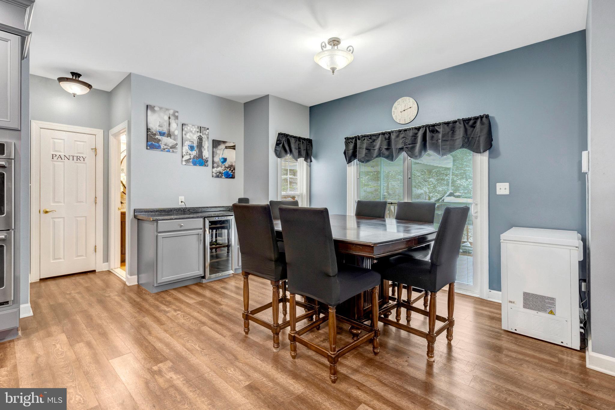 4169 Agency Loop Triangle, VA 22172 - Photo 15 of 56 Bright and inviting dining space awaits you.