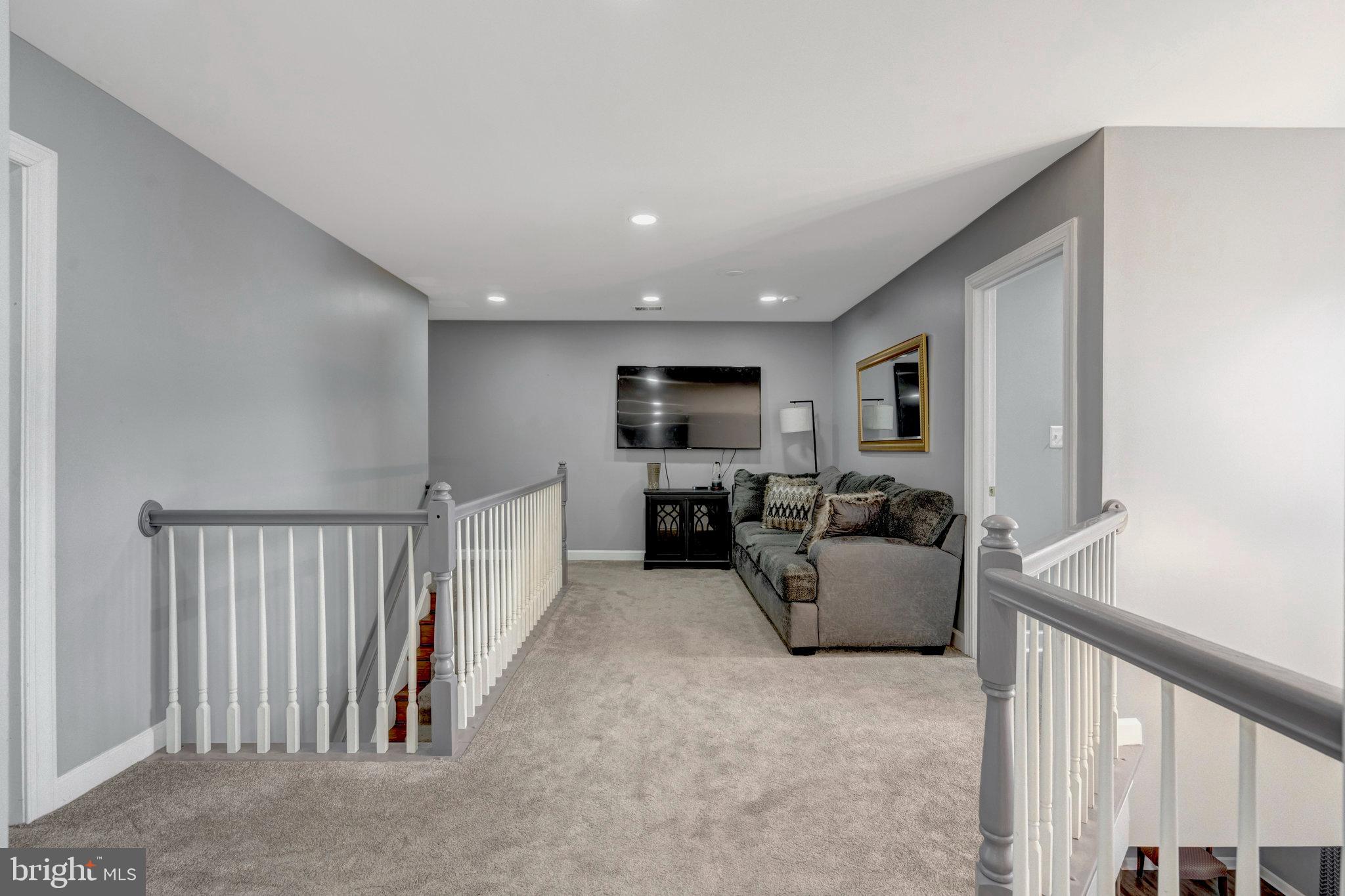 4169 Agency Loop Triangle, VA 22172 - Photo 21 of 56 Spacious landing with modern elegance.