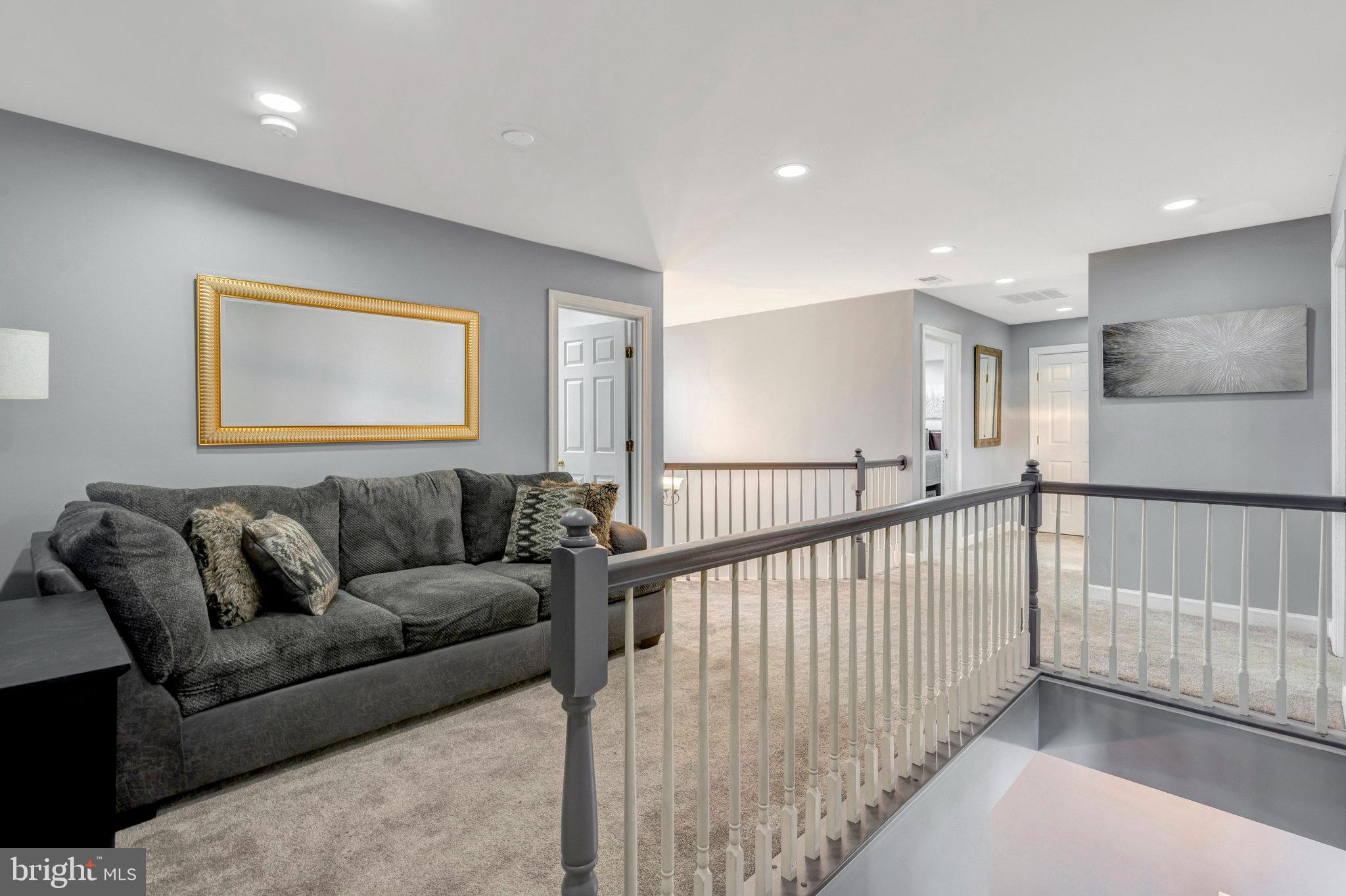 4169 Agency Loop Triangle, VA 22172 - Photo 22 of 56 Spacious landing with modern elegance.