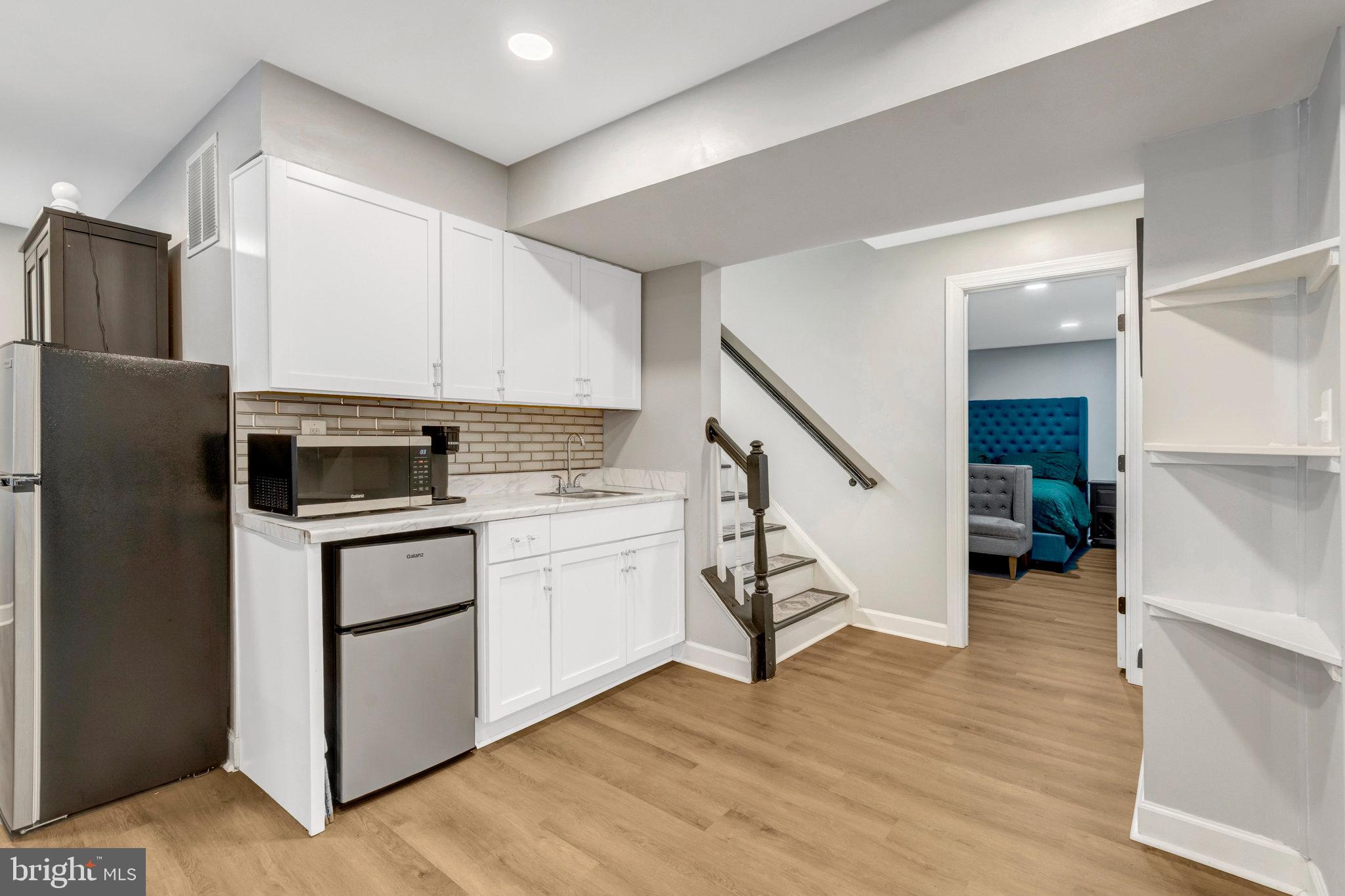 4169 Agency Loop Triangle, VA 22172 - Photo 35 of 56 Modern kitchen with sleek finishes.