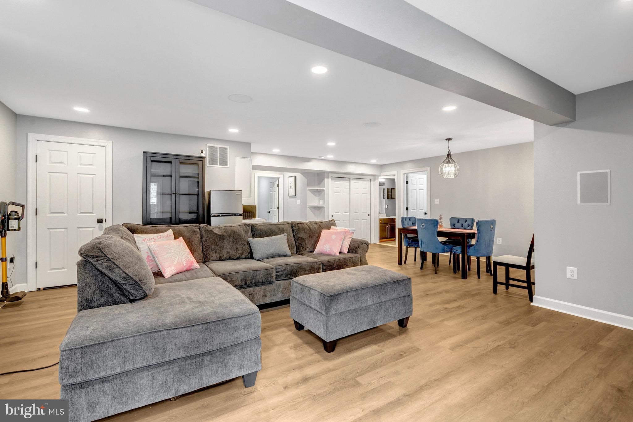 4169 Agency Loop Triangle, VA 22172 - Photo 37 of 56 a living room with furniture and kitchen view