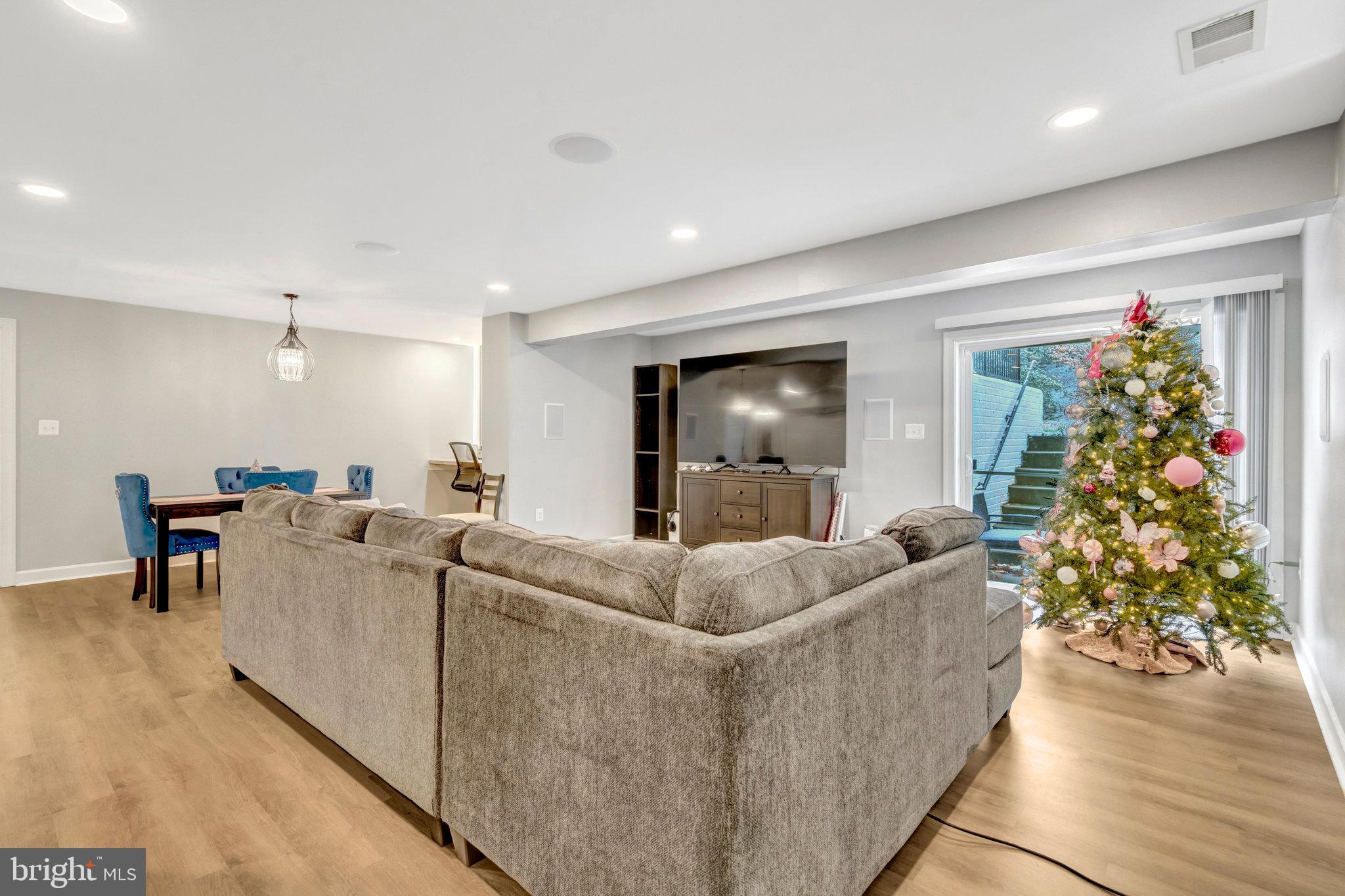 4169 Agency Loop Triangle, VA 22172 - Photo 38 of 56 a living room with furniture and a flat screen tv