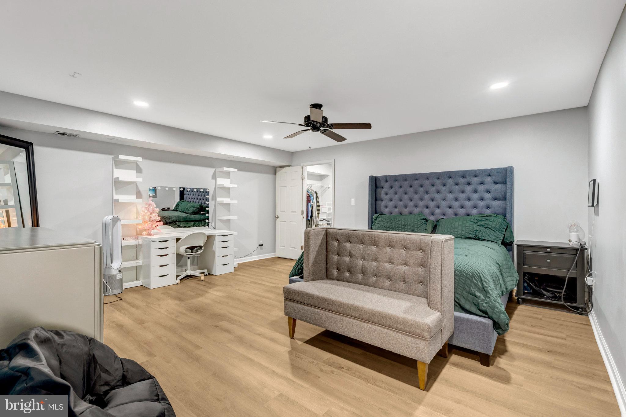 4169 Agency Loop Triangle, VA 22172 - Photo 40 of 56 Spacious modern bedroom with stylish decor.