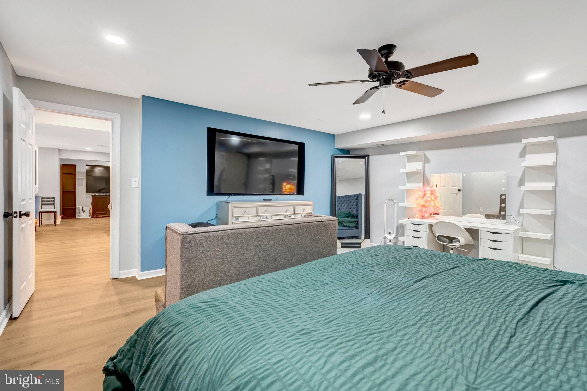 4169 Agency Loop Triangle, VA 22172 - Photo 41 of 56 Serene bedroom with modern accents.