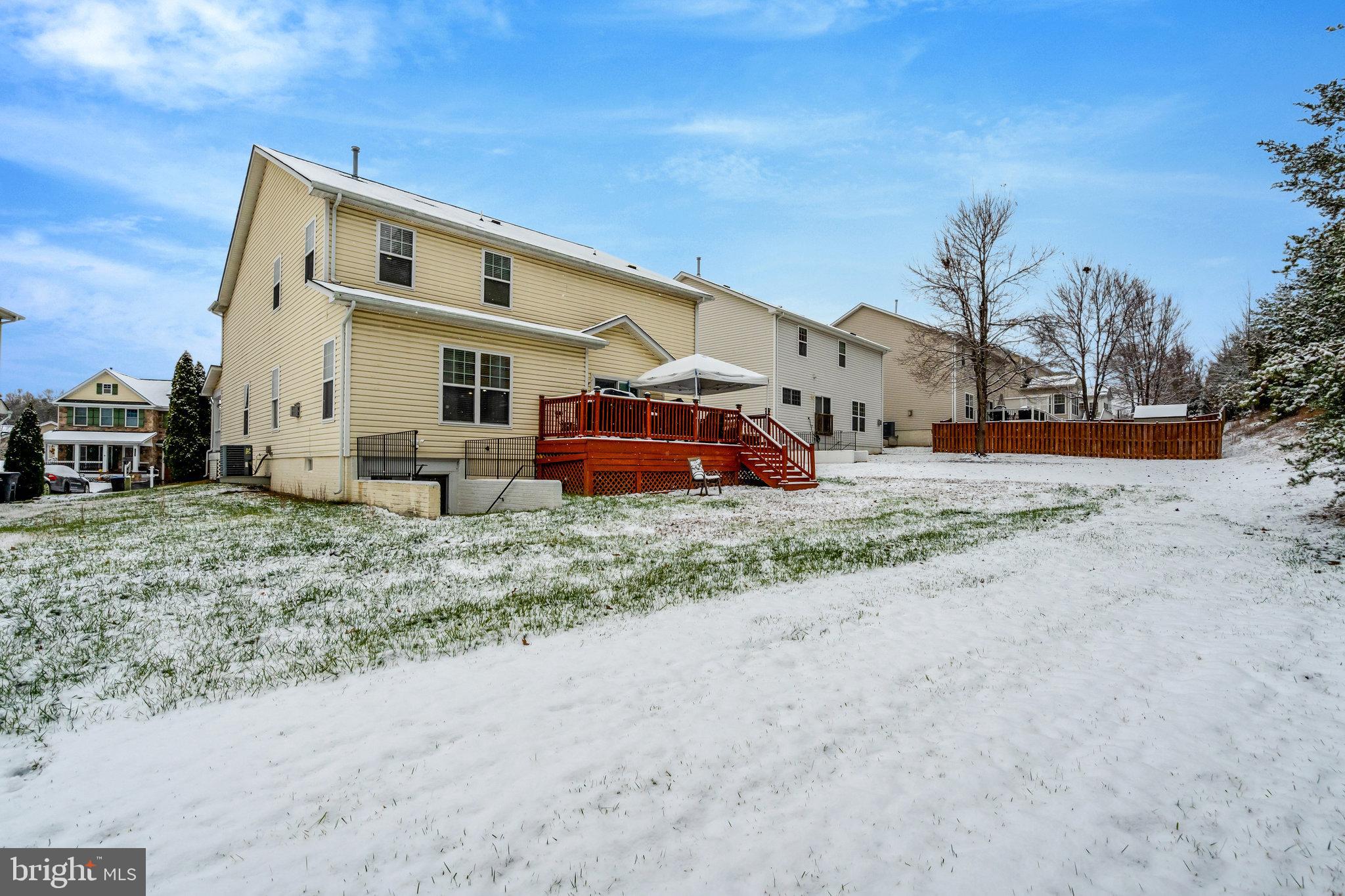 4169 Agency Loop Triangle, VA 22172 - Photo 48 of 56 Charming home nestled in a snowy landscape.