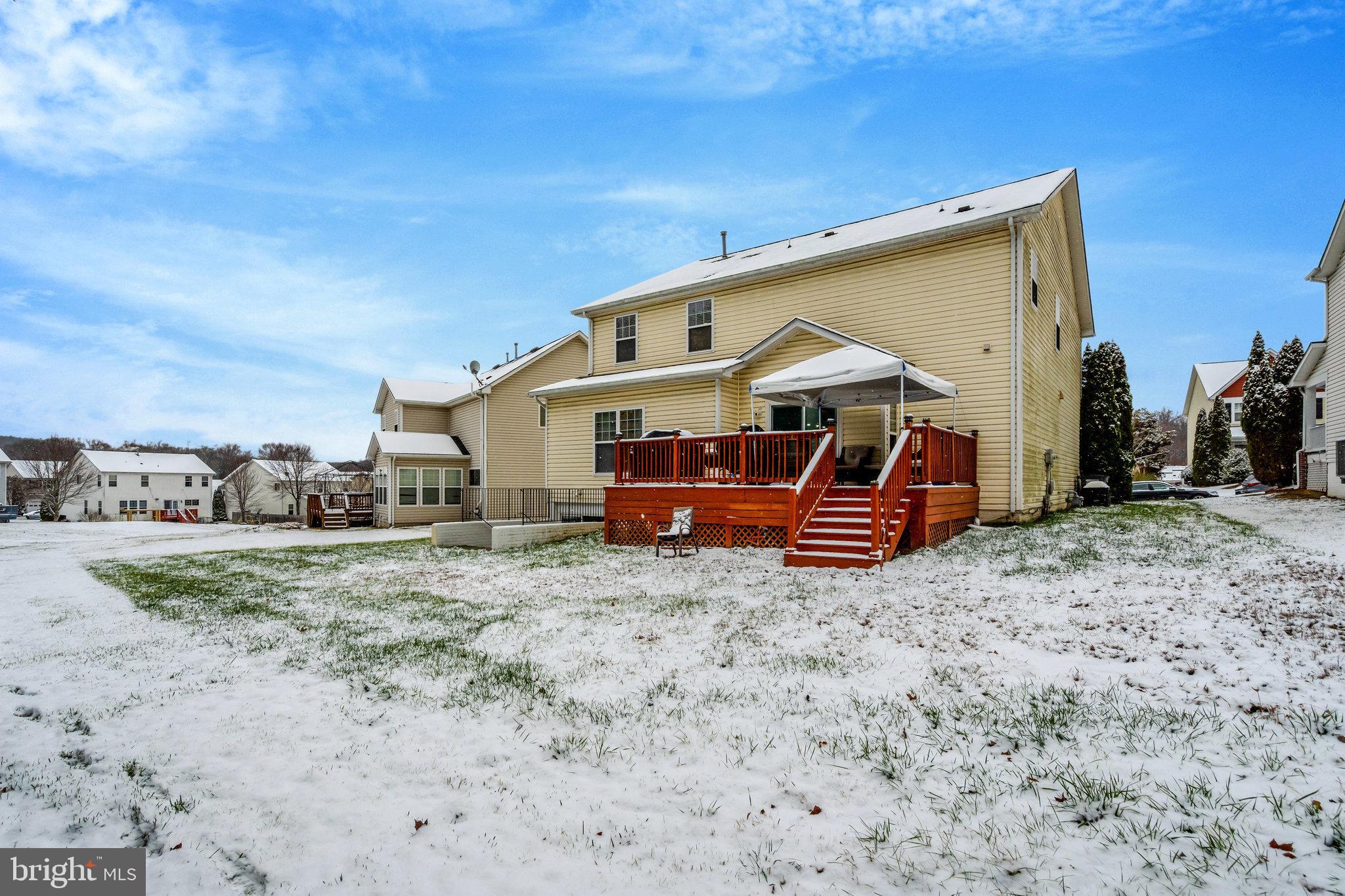 4169 Agency Loop Triangle, VA 22172 - Photo 50 of 56 Charming home nestled in a snowy landscape.