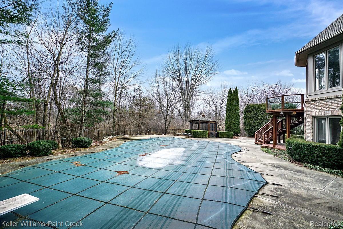 3473 Moceri Court Rochester, MI 48306 - Photo 11 of 58 Amazing privacy surrounds the pool & spa