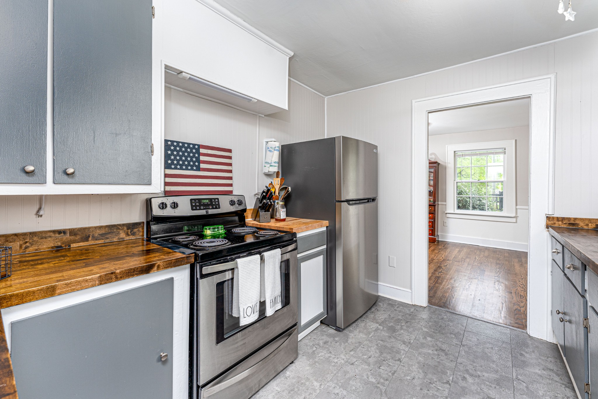 1156 Pierce Road Madison, TN 37115 - Photo 11 of 30 a kitchen with stainless steel appliances granite countertop a sink stove and refrigerator