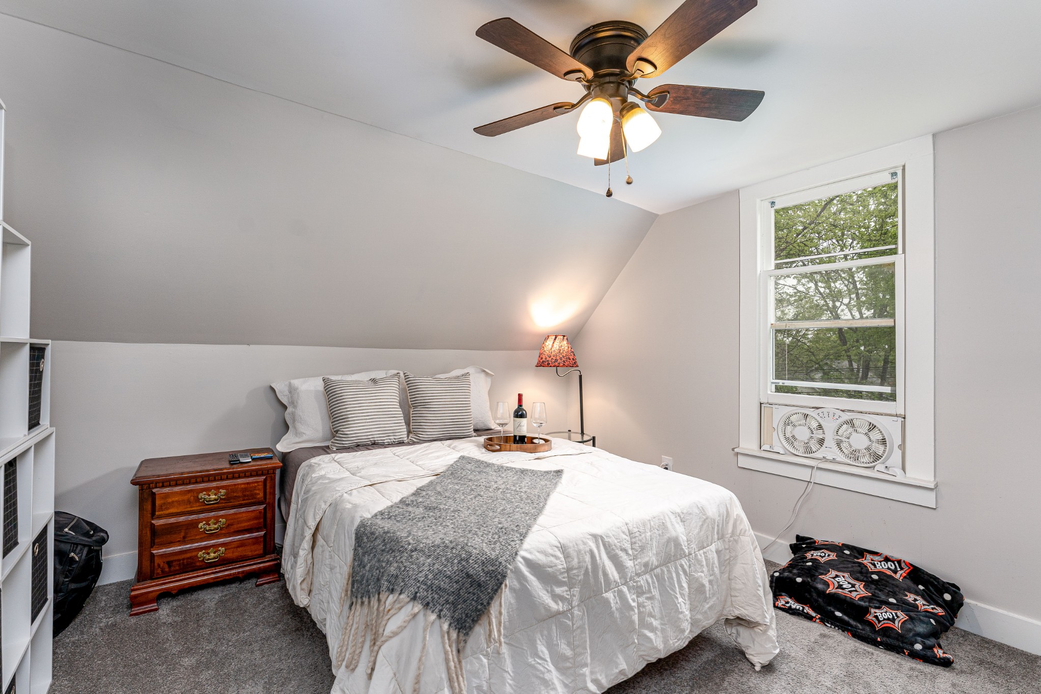 1156 Pierce Road Madison, TN 37115 - Photo 19 of 30 a bedroom with a bed and a chandelier