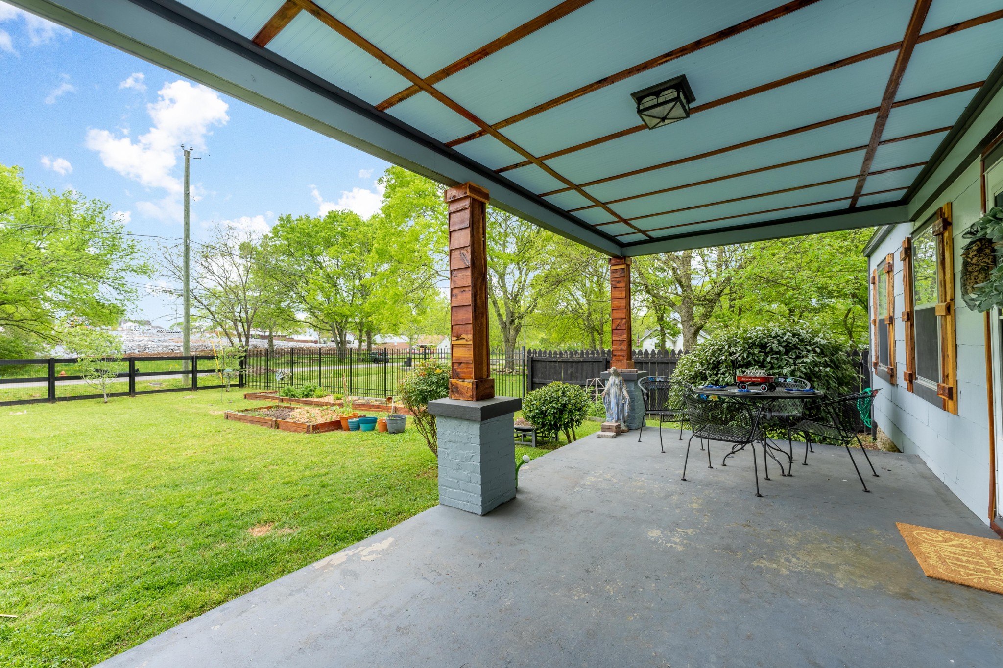 1156 Pierce Road Madison, TN 37115 - Photo 26 of 30 a view of a porch with furniture and garden