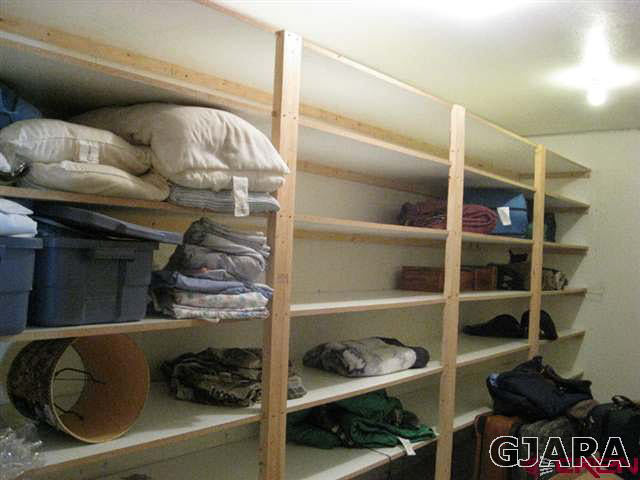 1452 16 Road Loma, CO 81524 - Photo 11 of 13 a room with lots of different colored cloths
