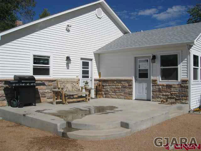 1452 16 Road Loma, CO 81524 - Photo 5 of 13 a view of a house with a patio