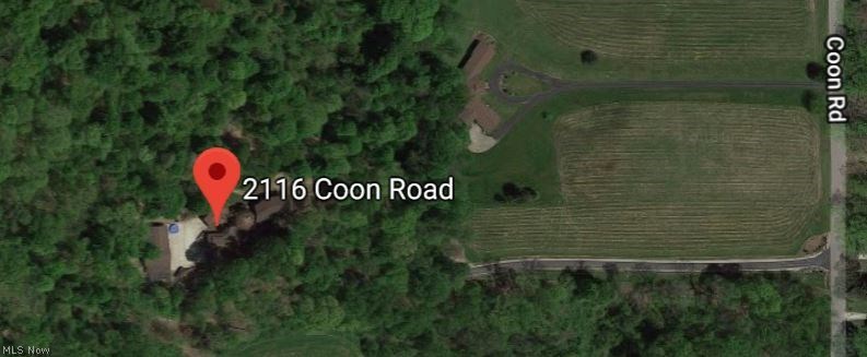 2116 Coon Road Akron, OH 44321 - Photo 35 of 35 2116 Coon Rd Copley Ohio 44321 is a sprawling combination of modern, old world & geodesic design, tons of stunning wood doors & trim which comes together absolutely beautifully on over 7 acres of secluded land w/ trails, awesome separate building/garage for your toys or home based business, paved drive sets well off the road! Gorgeous 4k+SF living space includes walkout finished basement (available 4th bedroom), 3 bedrooms, 2.5 well appointed bathrooms, 2 car attached garage & 3 door detached garage!