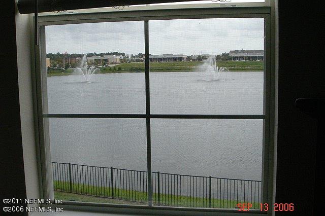 8550 Touchton Road, Unit 1424 Jacksonville, FL 32216 - Photo 2 of 5 a view of a lake from a window