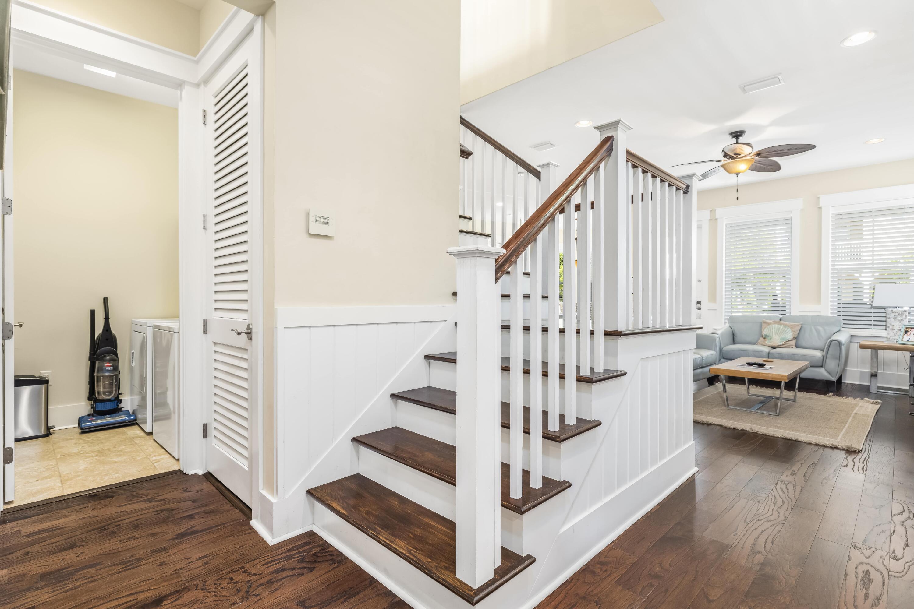 636 Flatwoods Forest Loop Santa Rosa Beach, FL 32459 - Photo 13 of 36 a view of entryway and hall with wooden floor
