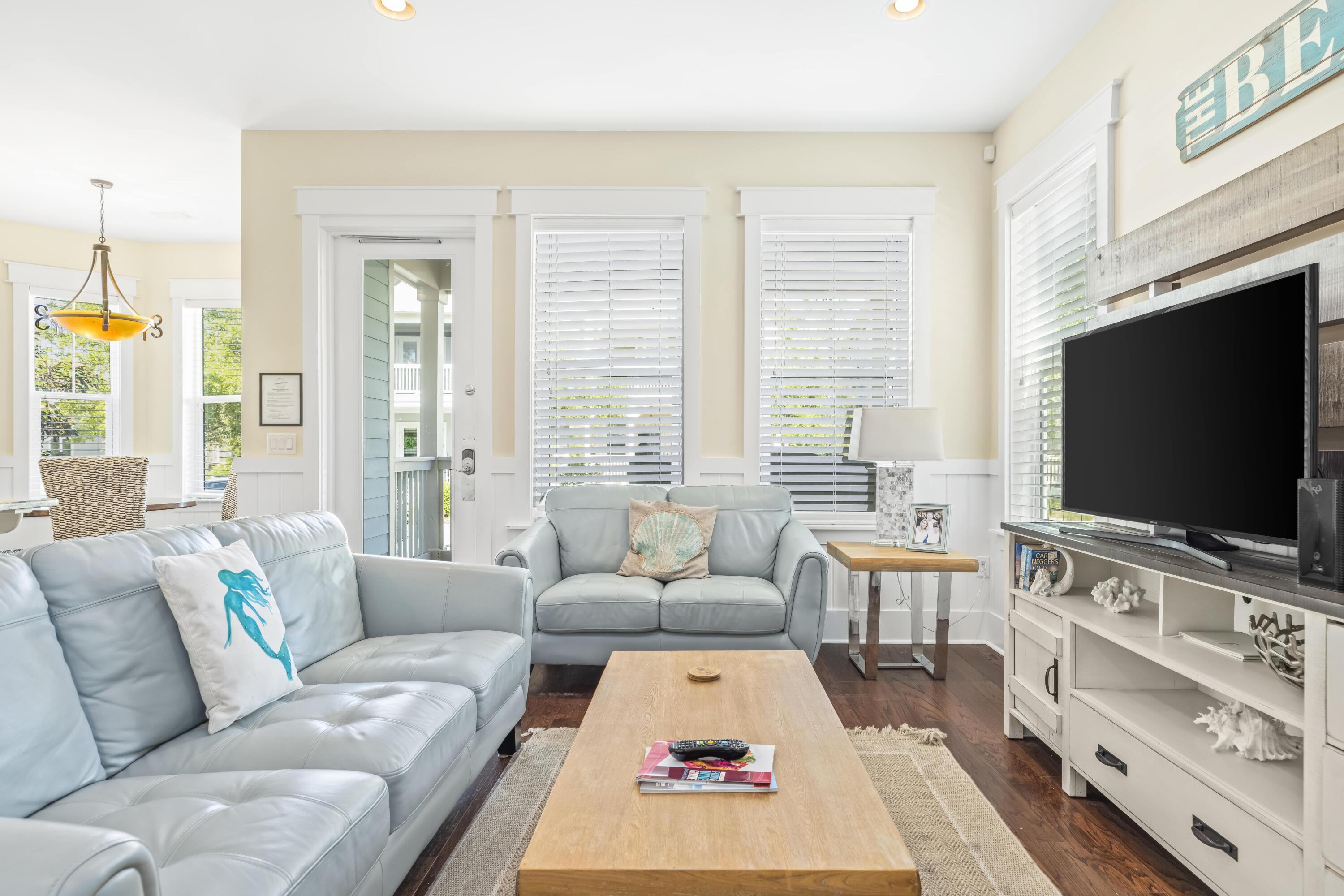 636 Flatwoods Forest Loop Santa Rosa Beach, FL 32459 - Photo 4 of 36 a living room with furniture and a flat screen tv