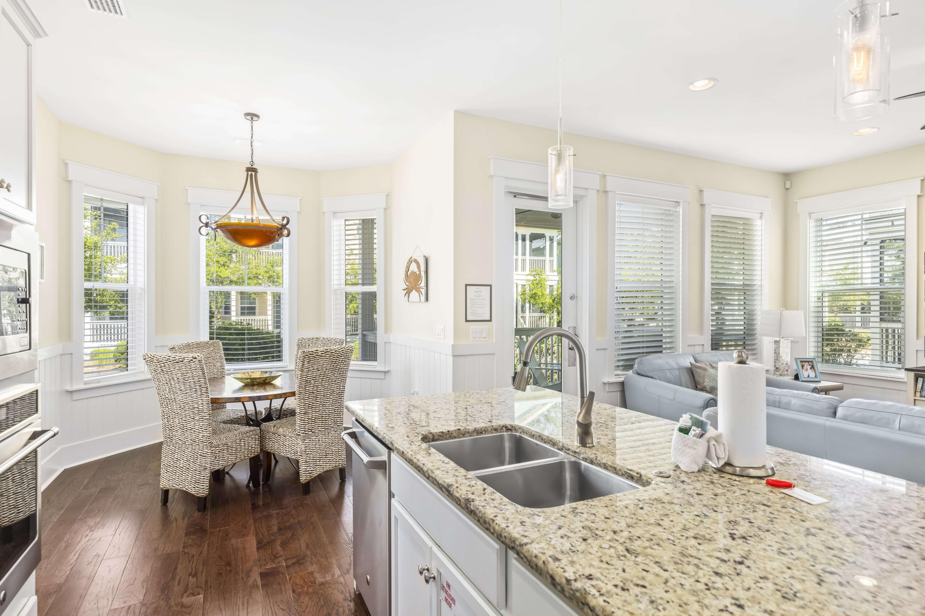 636 Flatwoods Forest Loop Santa Rosa Beach, FL 32459 - Photo 8 of 36 a living room with furniture and a chandelier