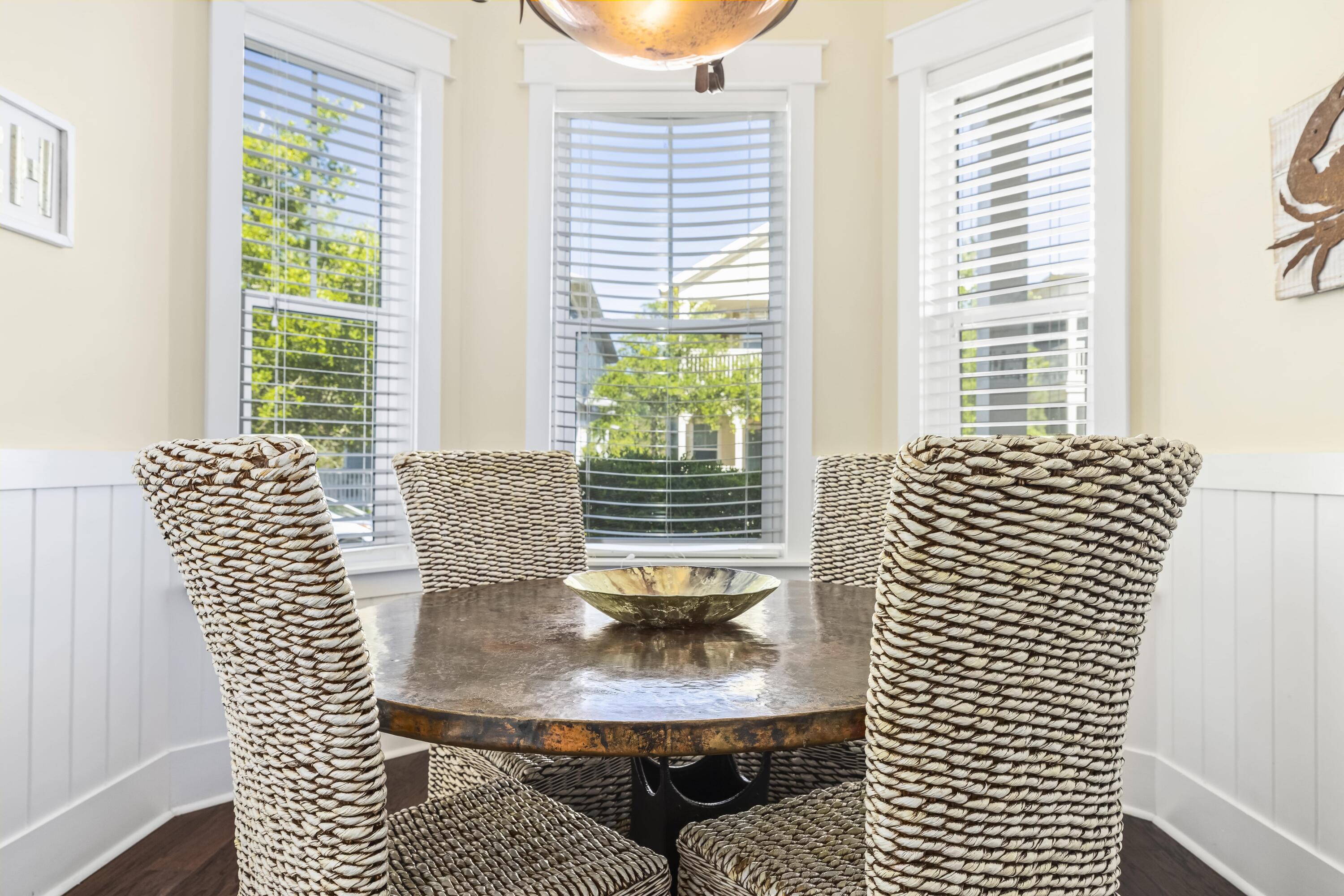 636 Flatwoods Forest Loop Santa Rosa Beach, FL 32459 - Photo 9 of 36 a view of a dining room with furniture