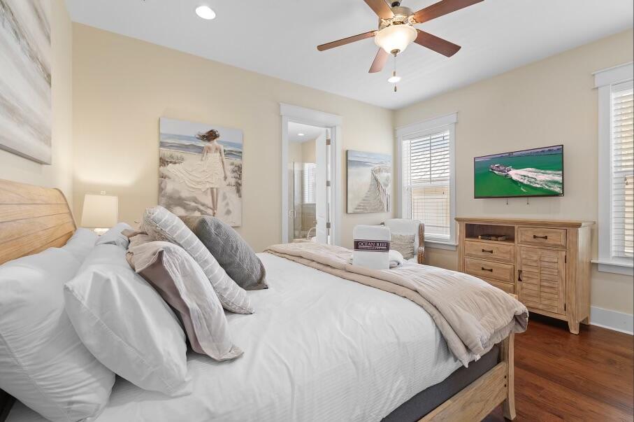 636 Flatwoods Forest Loop Santa Rosa Beach, FL 32459 - Photo 10 of 36 a bedroom with a bed and a flat screen tv