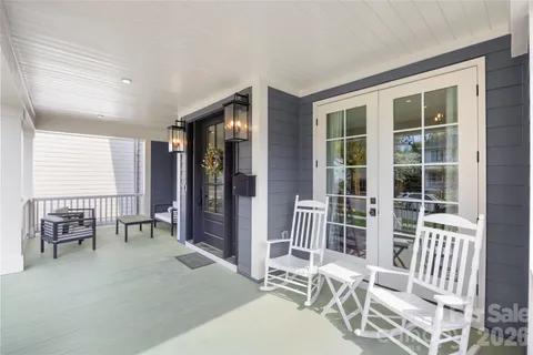 a view of a room with a large window