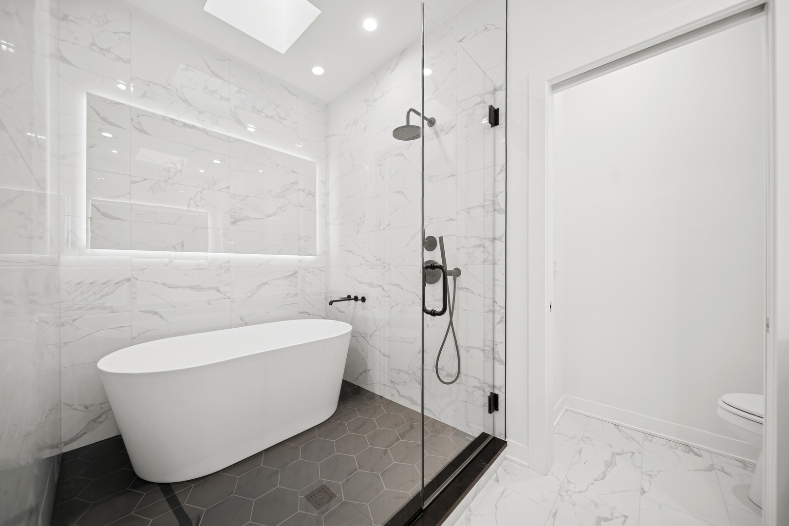 1333 East Madison Park Chicago, IL 60615 - Photo 11 of 32 a bathroom with a bathtub and a shower